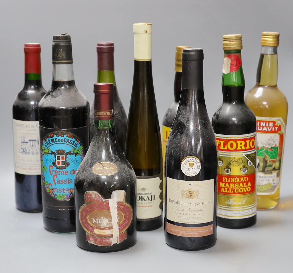 A selection of nine bottles of alcohol, to include Châteauneuf du Pape, Linie Aquavit, and others